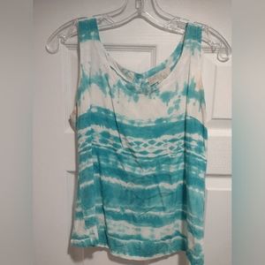 Sleeveless blue and white blouse